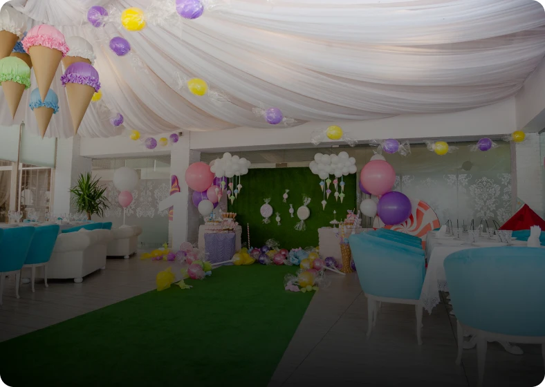 Festive venue with balloons and drapery